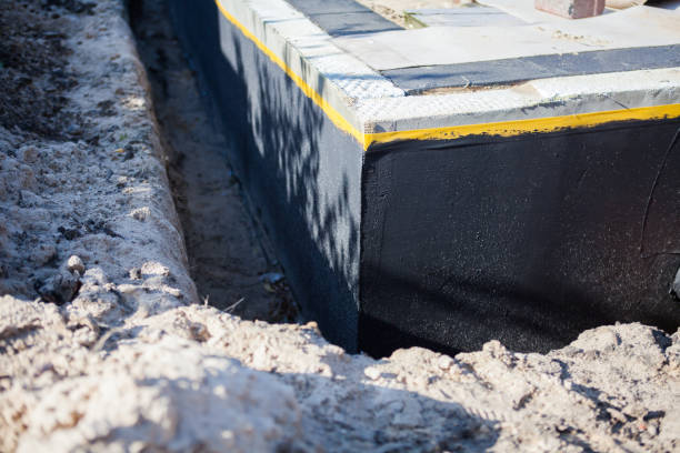 Professional Waterproofing technician working in Catlin, IL